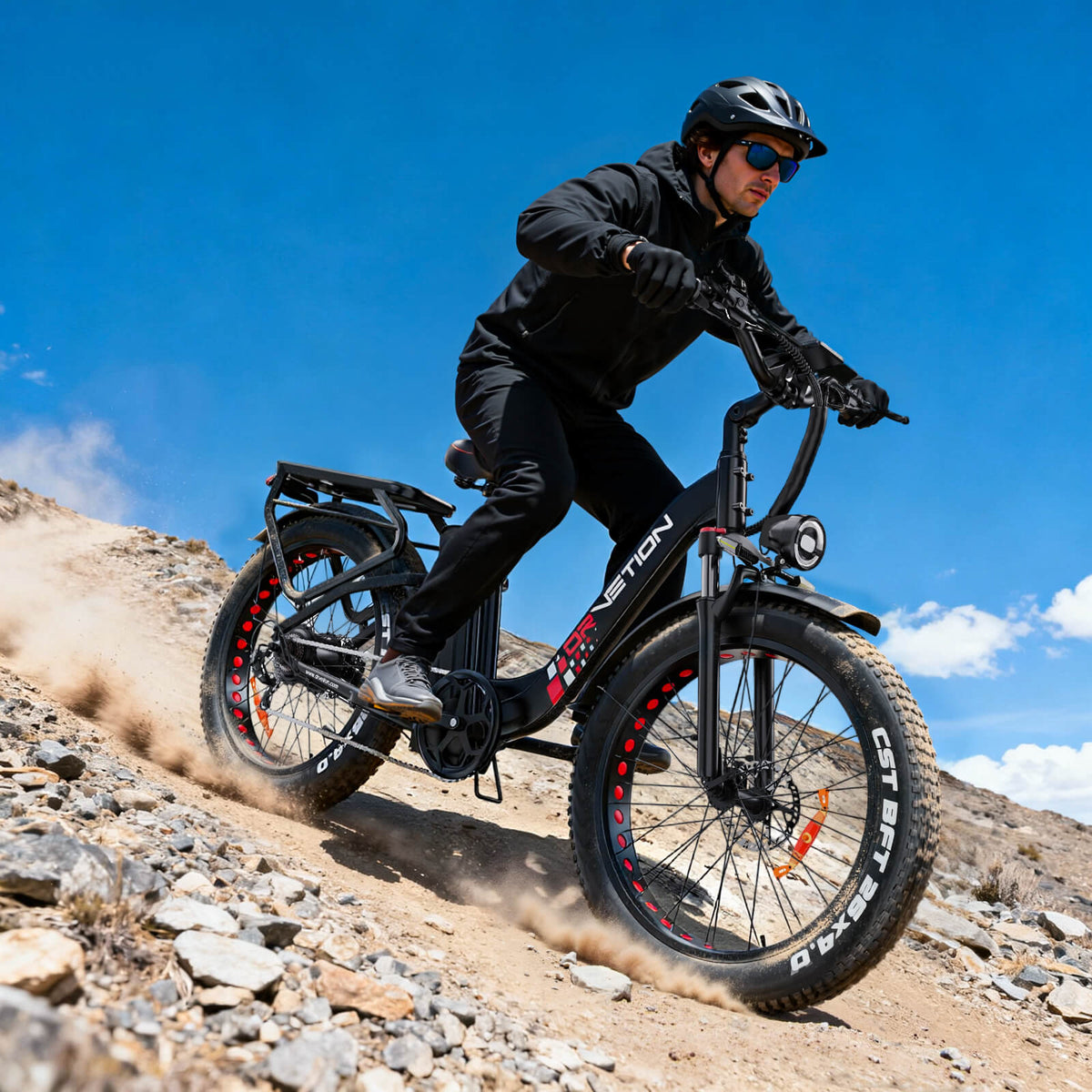 Drvetion CTR26 — helmeted rider on an e-bike on a rocky path