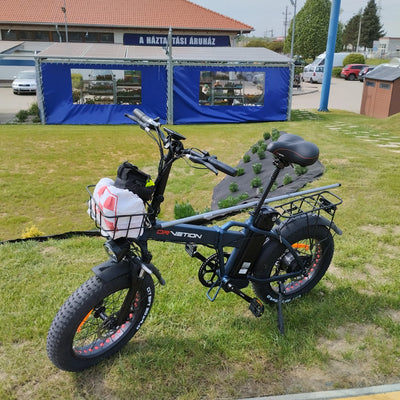 Drvetion AT20 PRO — e-bike parked on a lawn with a bag at the handlebar