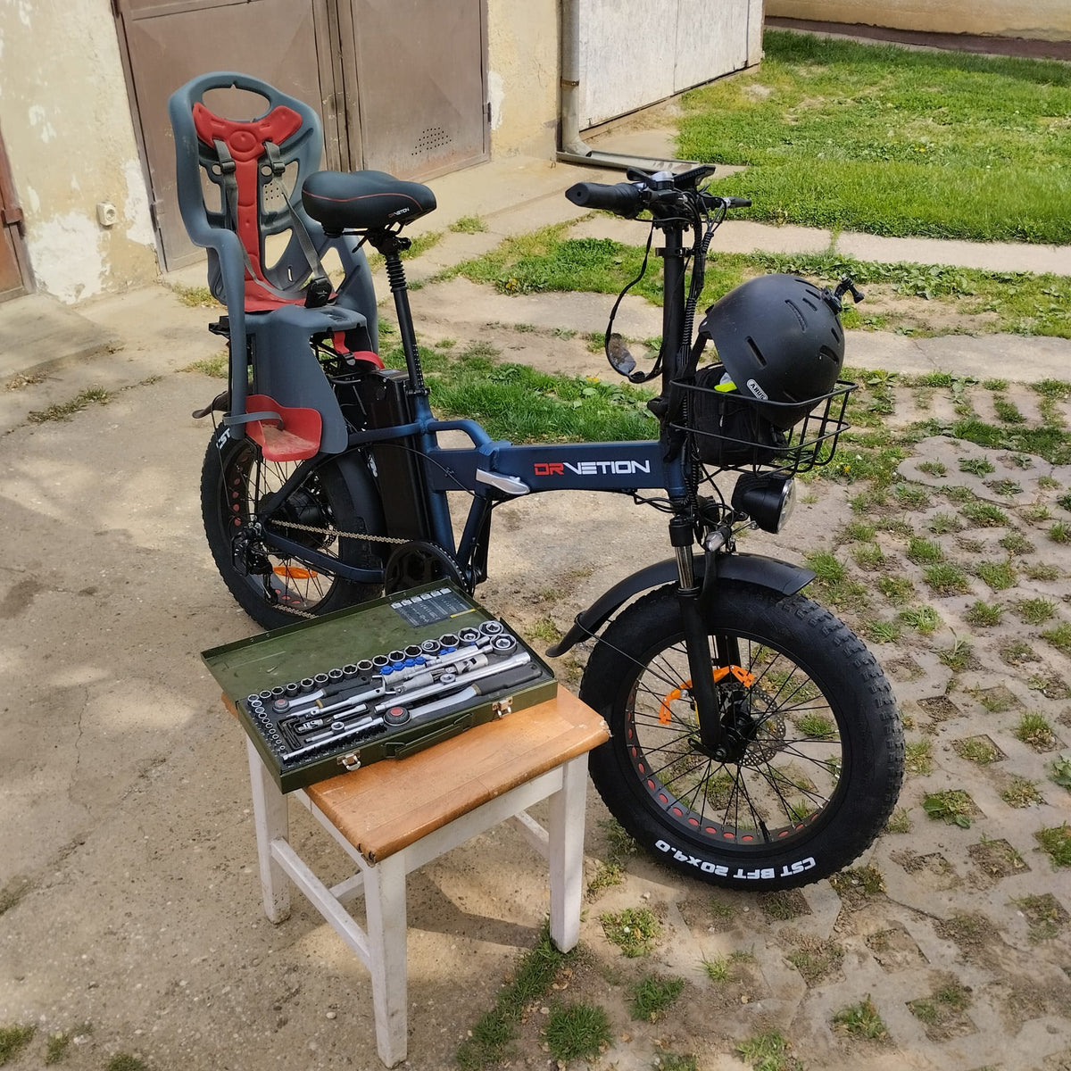 Drvetion AT20 PRO — e-bike parked beside a chair outdoors