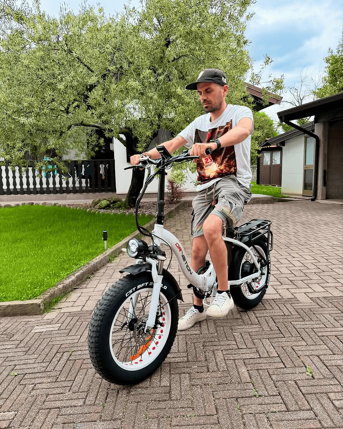 Drvetion CT20 — rider on a white e-bike along a paved path